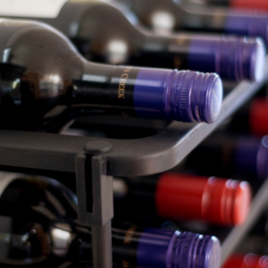 Close-up shot of wine bottles on a Vinrac wine rack.