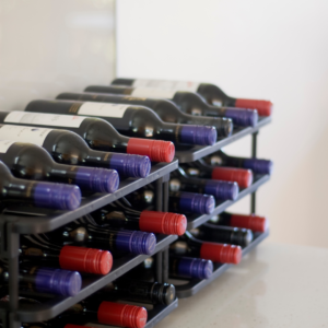 Vinrac wine racks on top of a bench.