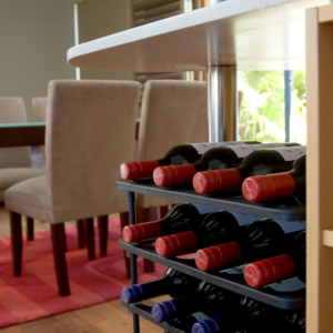 Vinrac wine racks under a kitchen bench.
