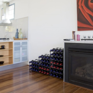 Vinrac wine racks against a wall in the living room.