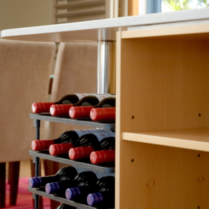 Vinrac wine racks under a kitchen bench.