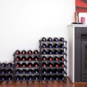 Vinrac wine racks next to a fireplace.
